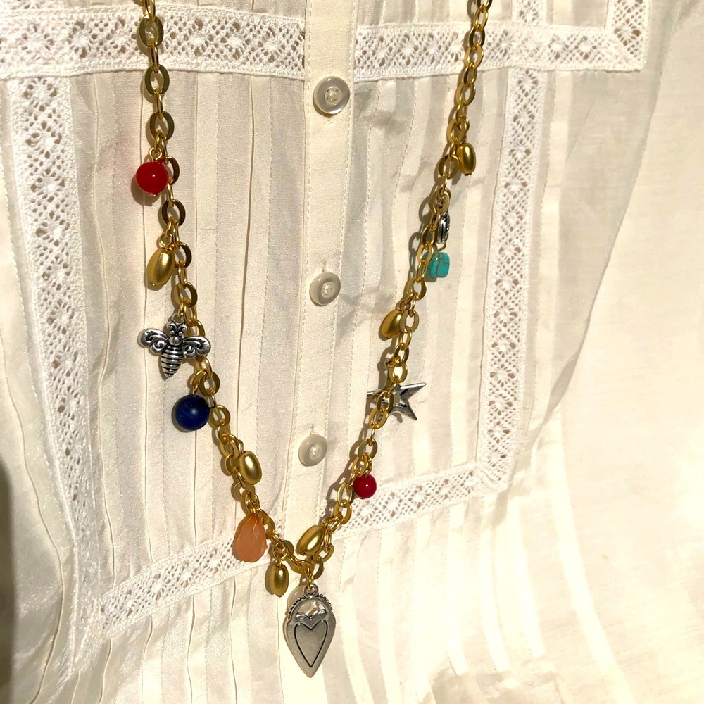 Chico’s gold toned long charm necklace NWT